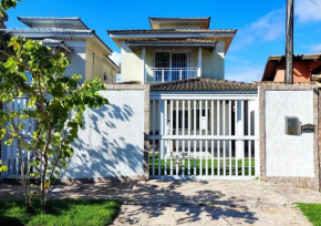 Casa Piscina em Condomínio 5min Praia ITACOATIARA.